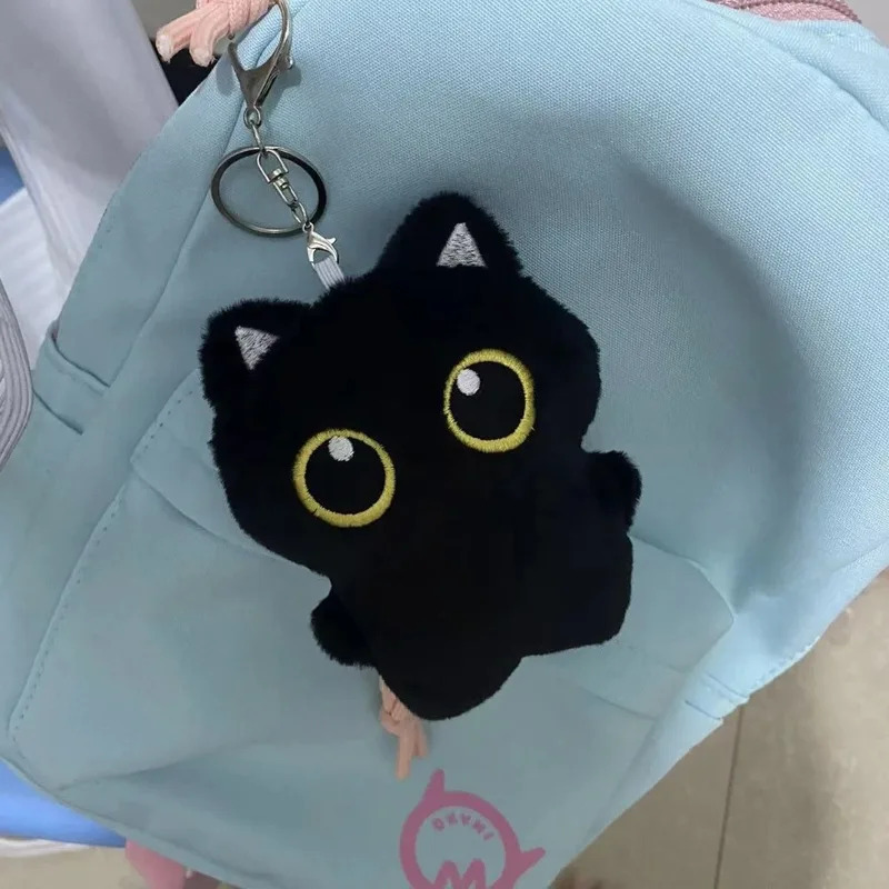 Cute plush toy of a black cat, – Photography Rules Bewertung und Preis